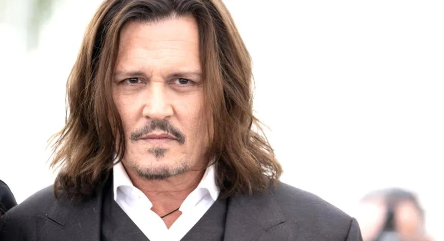 Johnny Depp jako Willy Wonka